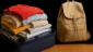 Sonhar com mala cheia de roupas: mudanças e escolhas